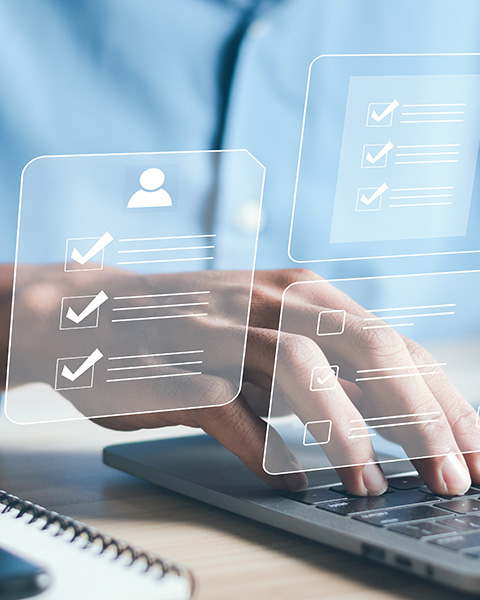 person typing on laptop with checklists and forms digital interface for productivity tasks related to organizing ten different items