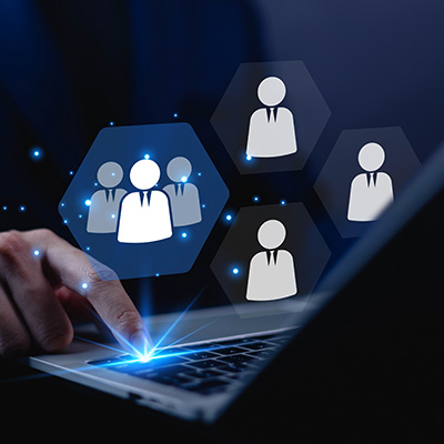 person using laptop with digital icons of people representing 8 user interactions and engagement
