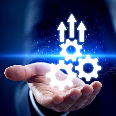 hand holding gears with upward arrows indicating progress in technology and business strategies for efficiency and growth 11 plans 11 innovations