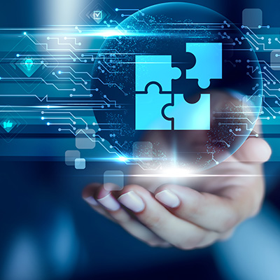 a hand holding a glowing globe with puzzle pieces and digital connections symbolizing problem solving and teamwork in a technology context 11 digital solutions 11 strategies 11 connections