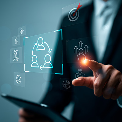 businessman interacting with digital interface showcasing three icons representing collaboration connectivity and productivity
