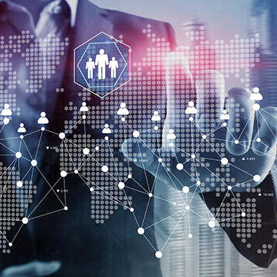 businessman interacting with digital network visualization showing global connections and data trends related to nine key metrics
